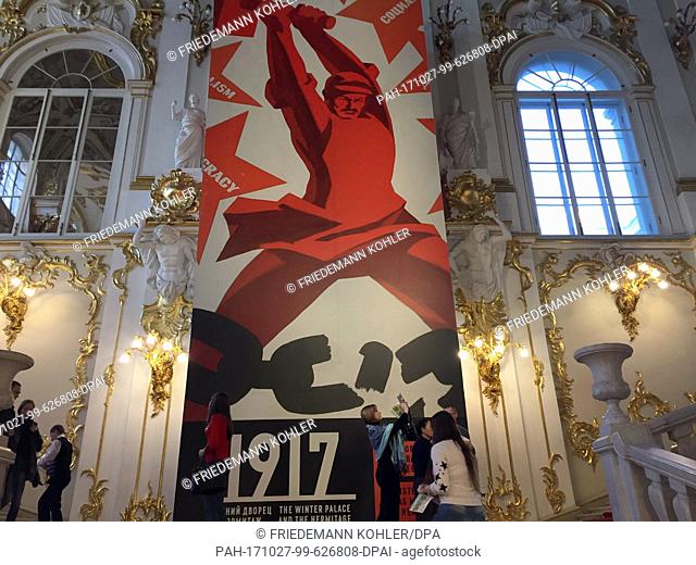 A poster for an exhibition on the October Revolution can be seen at the Winter Palace in St. Petersburg, Russia, 25 October 2017
