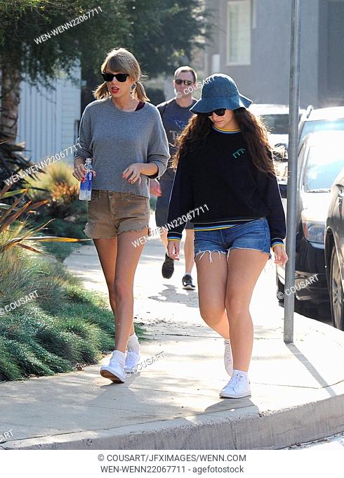 Taylor Swift and best pal Lorde goes for a hike in Beverly Hills. The singers chit chatted through the trails and was followed closely by their bodyguards