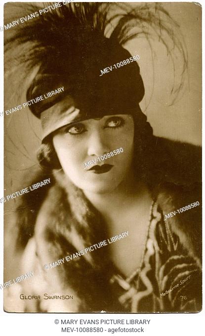 Gloria Swanson (1899 - 1983), American film actress, wearing a cloche hat with a feather