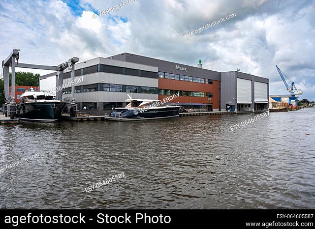 Leiderdorp, Holland, The Netherlands, July 10, 2023 - Offices and luxury yachts at the river Rhine