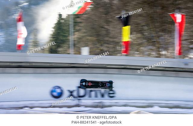 Bobsleigh athletes Nick Poloniato and Neville Wright from Canada in the 3rd lap going through the echo curve in Schoenau am Koenigssee in Germany