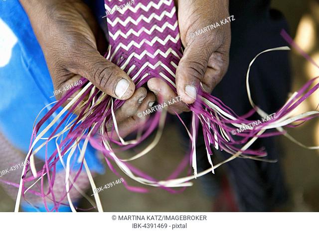 Hands of a woman weaving a mat, ethnic group of Pokomo, Pokomo settlement, Mbelezoni, Tana River Delta, Kenya