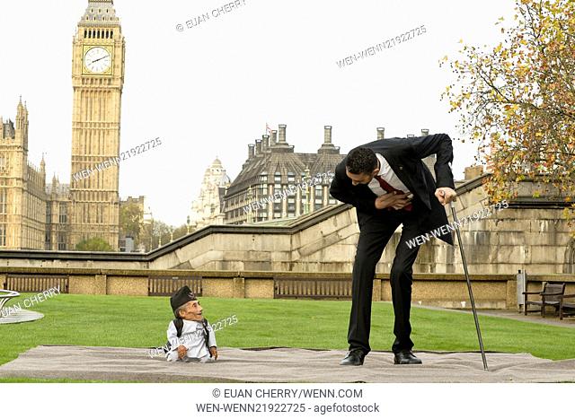 The shortest man ever Chandra Bahadur Dangi 54.6com - 21.5 inches) and the tallest living man Sultan Kosen 251cm - 8ft 3 inches) meet for the first time in...