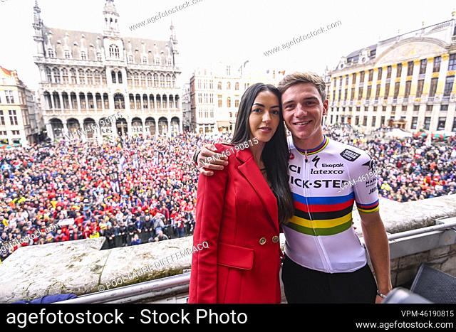 Remco Evenepoel and his partner Oumaima Oumi Rayane pictured at the celebration on the balcony of Brussels city hall on the Grand-Place - Grote Markt