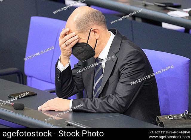 dpatop - 18 November 2021, Berlin: Olaf Scholz (SPD), Executive Federal Minister of Finance, attends the session of the Bundestag