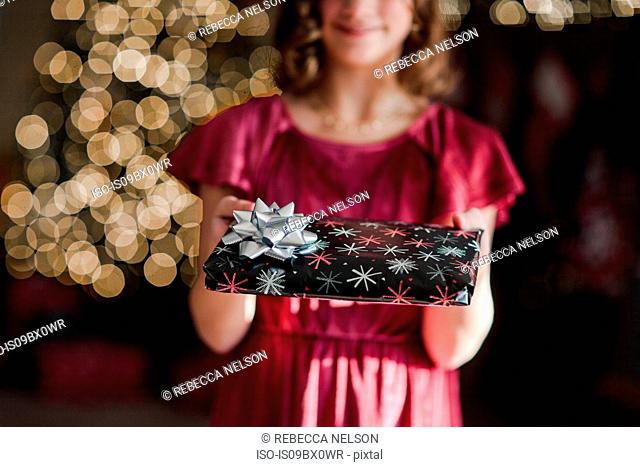 Girl holding Christmas gift