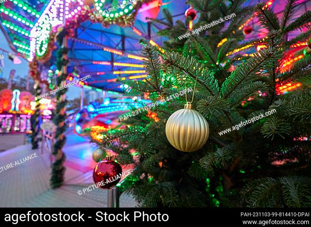03 November 2023, Berlin: View of the ""Winterzauber"" Christmas market in Lichtenberg. Until December 30, visitors to Landsberger Allee can expect around 70...