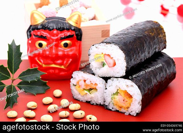 Japanese traditional Setsubun event, Masks of Oni demon and ehomaki are used on an annual event