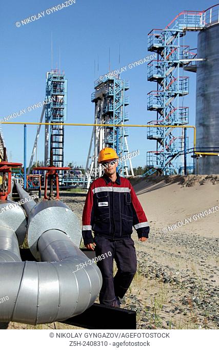 Russia, Khanty-Mansi Autonomous Okrug-Yugra. Oil company Russneft. Male operator of oil production. Nizhnevartovsk district