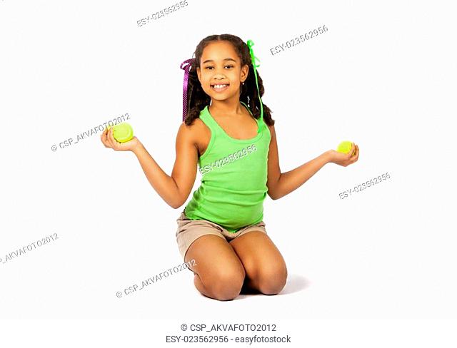 Girl with tennis balls
