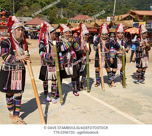 Akha women dancing at the New Year Festival in Mae Salong, Chiang Rai Province, Thailand