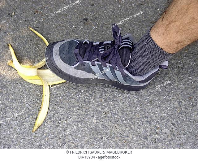 Banana skin on the road as symbol for slipping, falling down etc