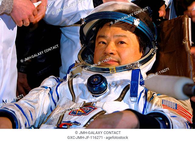 Astronaut Leroy Chiao, Expedition 10 commander and NASA ISS science officer; cosmonaut Salizhan S. Sharipov (out of frame)