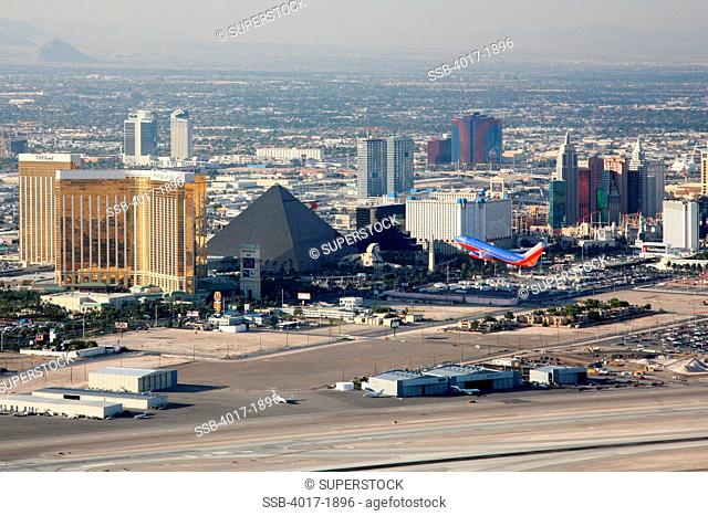 Jet taking off near the Las Vegas Strip showing how close McCarran Airport is to the strip