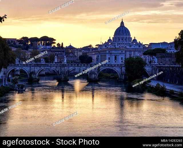 View over Tiber river with Castel Sant'Angelo and St. Peter's Basilica, Rome
