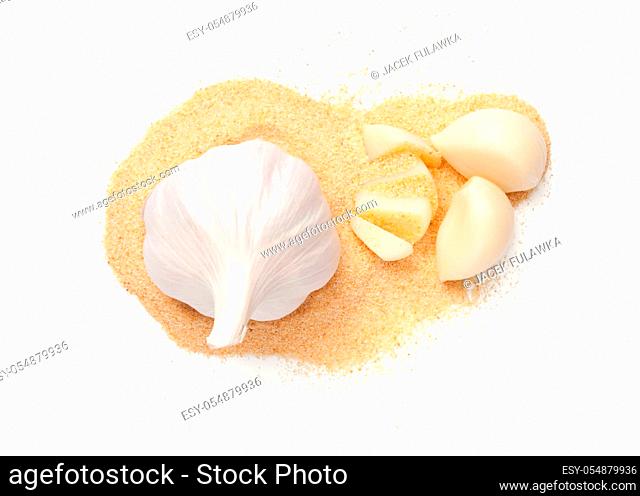 Garlic whole, cloves and powder isolated on white background. Flat lay. Top view