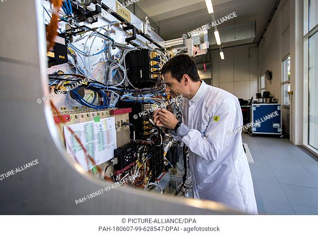 30 May 2018, Germany, Darmstadt: Karel Kotarowski, Airbus engineer, working on the space probe. ""BepiColombo"" is a space probe and its flight to Mercury is...