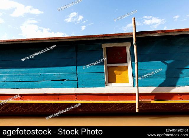 Coloured boat on Mekomg river in Laos