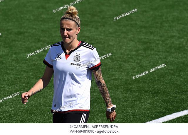 Germany's Anja Mittag walks on the pitch during a training session at the FIFA Women's World Cup 2015 at the Avenue Bois-de-Boulogne, Laval in Montreal, Canada
