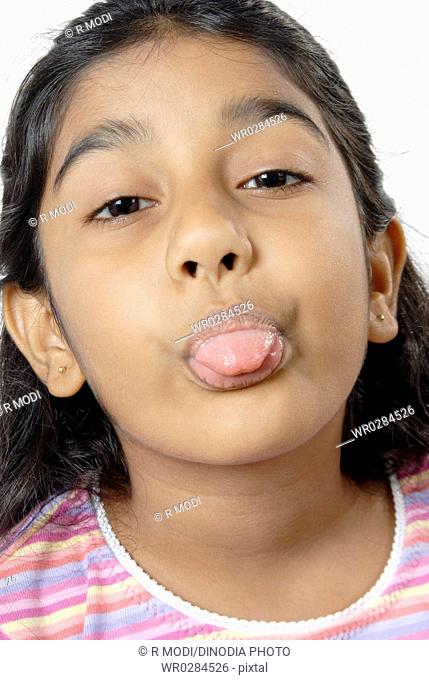 Young girl showing funny expression looking at camera MR 152