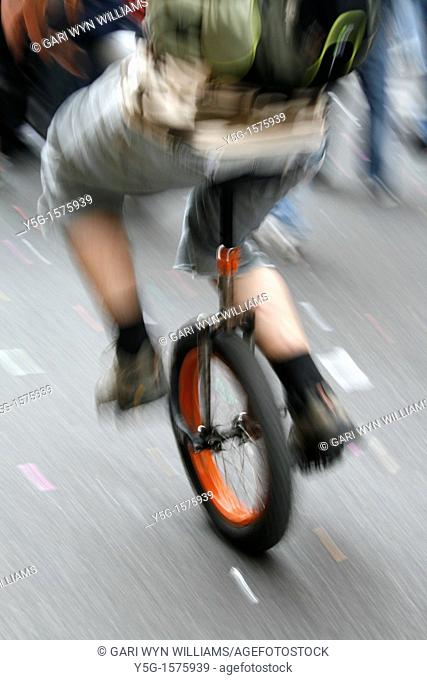 fast unicycle rider in town