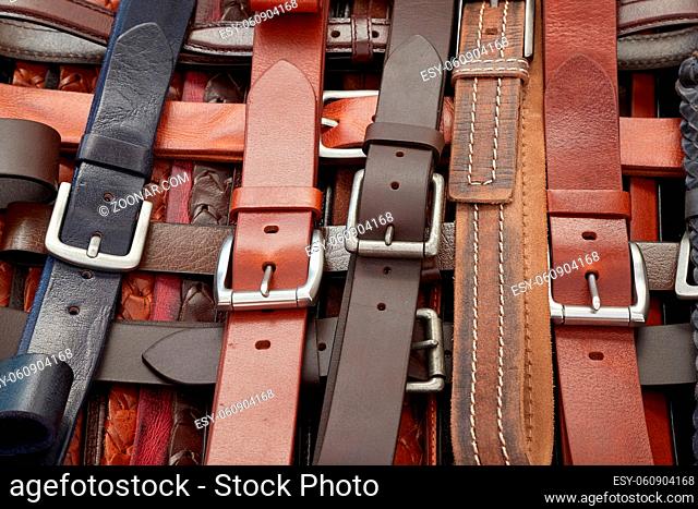 Leather belts layed out for sale