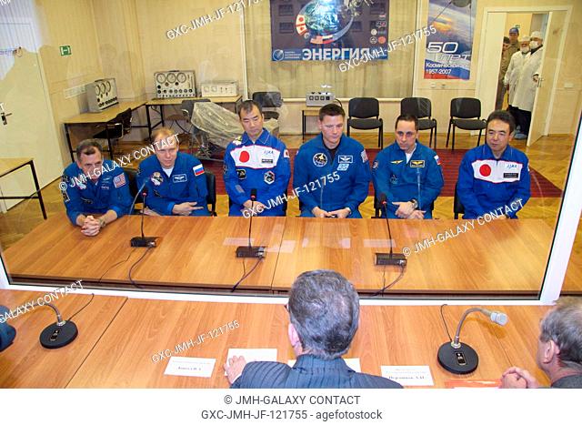 - At the Baikonur Cosmodrome in Kazakhstan, the prime and backup crews for Expedition 22 meet with Russian space officials in their suit up and integration...