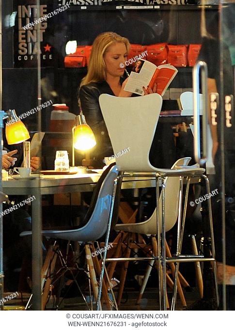 Katherine Heigl filming late night scenes for her new show ""State Of Affairs"" in downtown Los Angeles. The actress was also seen reading a book during break...