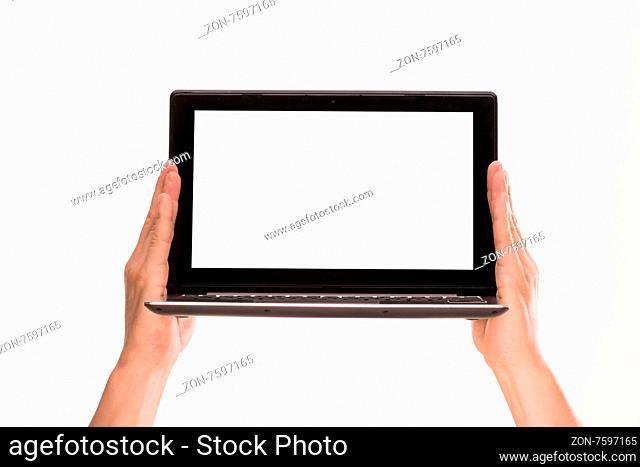Male#39;s hands holding laptop above him. Black screen of laptop computer is nice idea for your messages