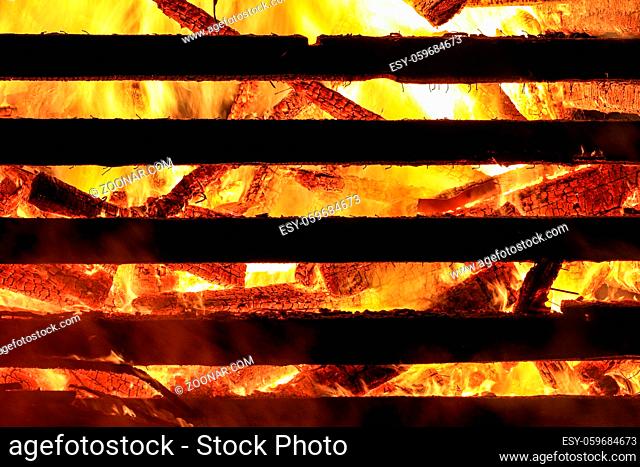 Logs in fire. Big huge traditional fire blaze glow. Background wallpaper