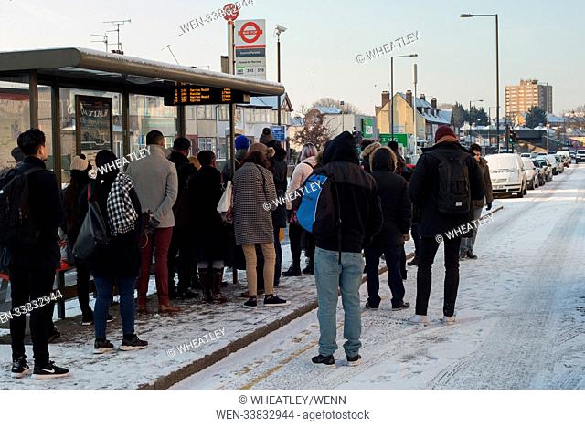 People struggle into work as cold weather intensifies across the UK causing disruption to commuters travel plans. Featuring: Atmosphere, View Where: London