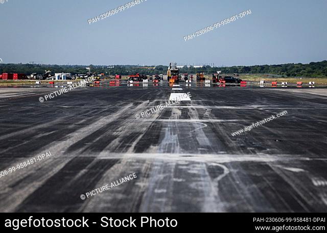 06 June 2023, Hamburg: A runway at Hamburg Airport is closed for renewal work. From May 31 to June 28, 2023, the upper surface layer of Runway 05/23...