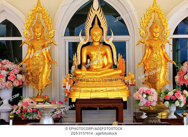 Golden idols of lord Buddha, outside the main building of Wat Prathat, Pha Sorn Kaew, in Khao Kor, Phetchabun, Thailand