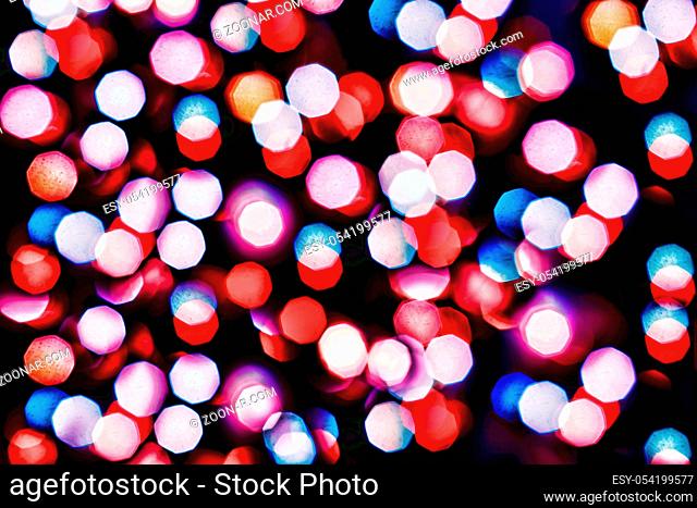 light bokeh background. Festive Christmas background. Elegant abstract background with lights and stars