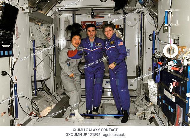 NASA astronaut Peggy Whitson (right), Expedition 16 commander; Russian Federal Space Agency cosmonaut Yuri Malenchenko, flight engineer; and South Korean...