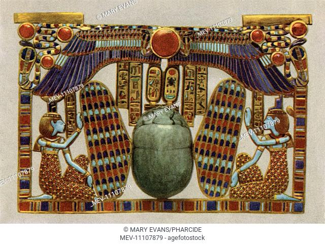 A pectoral from the tomb of Pharao Tutankhamun (reigned 1332–1323 BC). It is composed of a winged scarab, flanked by the goddesses Nephtys (left) and Isis...