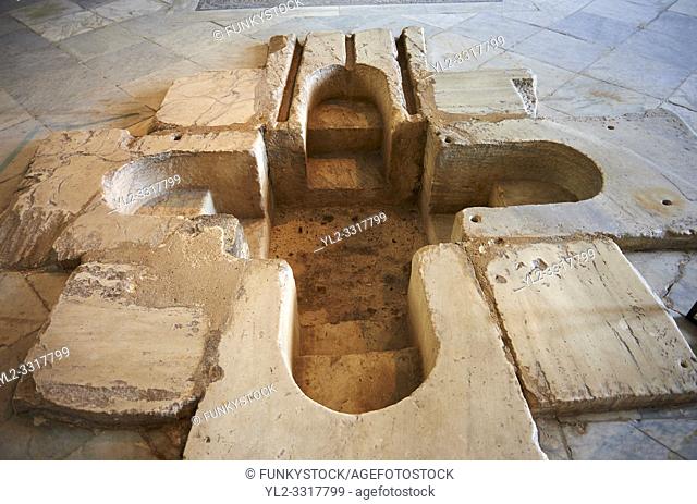 Sixth century Byzantine Roman Christian walk in Baptismal font made from marble. The Bardo National Museum, Tunis, Tunisia