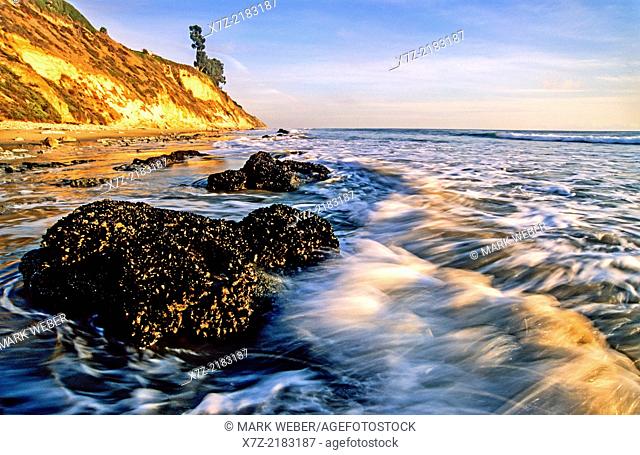 Santa Barbara, Arroyo Burro and Hendrys Beach surf and shoreline at sunset in the city of Santa Barbara in southern California