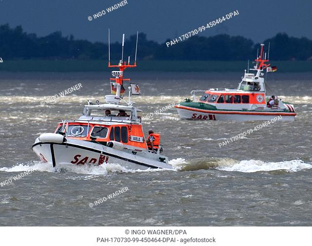 The DGzRS rescue boats ""Adele"" (l) and ""Otto Baer"" interrupt their excursion with visitors on 'Tag der Seenotretter' (lit