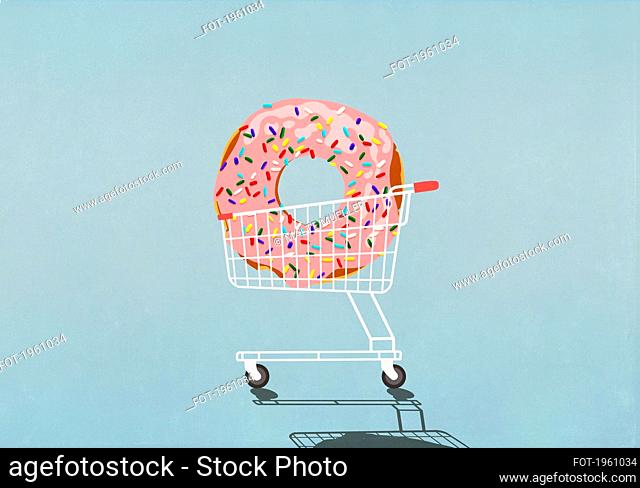 Large sprinkled donut in shopping cart