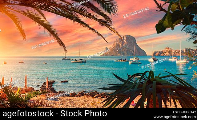Cala d'Hort beach. Cala d'Hort in summer is extremely popular, beach have a fantastic view of the mysterious island of Es Vedra