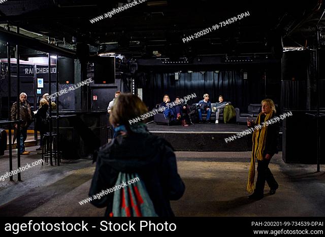 01 February 2020, Hamburg: Participants walk across the dance floor and sit on the stage at the Hamburg club Kaiserkeller during the Open Club Day