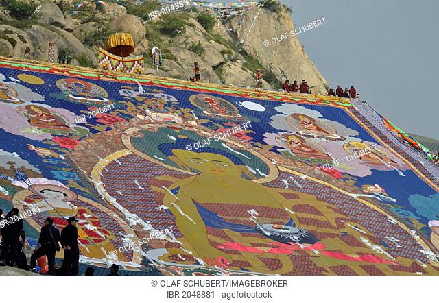Tibetan Buddhism, Shoton or Shodon Festival with the unrolling of the huge thangka, a silk painting depicting Buddha, Drepung Monastery, Lhasa, Tibet, China