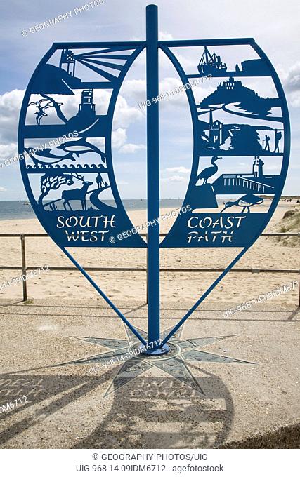 South West coast path sign Studland, Dorset, England. The South West Coast Path National Trail offers 630 miles of superb coastal walking