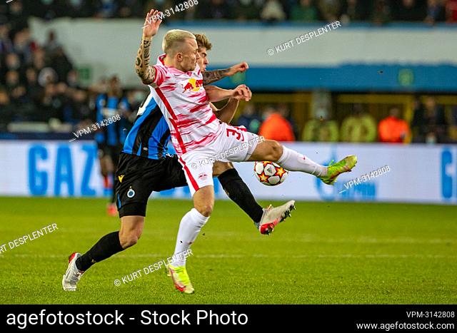 Club's Charles De Ketelaere and Leipzig's Jose Angel Esmoris Tasende fight for the ball during a game between Belgian soccer team Club Brugge and German club RB...