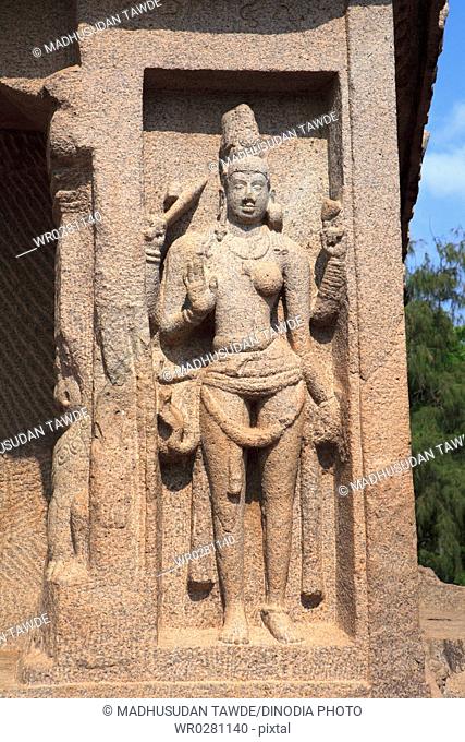 Ardhanariswara god Shiva statue in Dharmaraja Ratha and Pancha Rathas Monolith rock carving temples , Mahabalipuram , District Chengalpattu , Tamil Nadu
