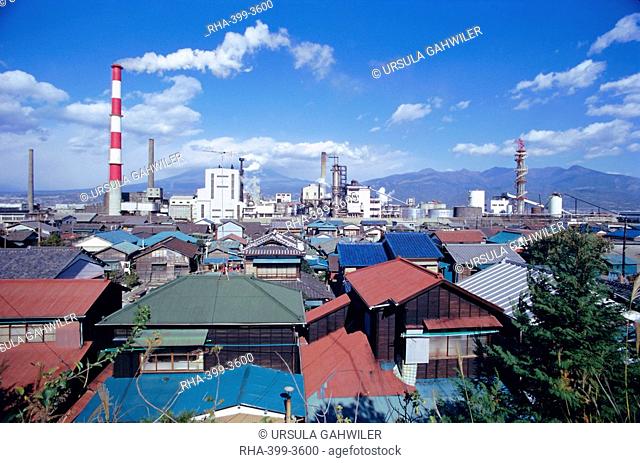 Industrial complex of paper mill and city skyline, Yoshiwara, Japan, Asia
