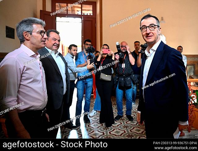 13 March 2023, Brazil, Belo Horizonte: Cem Özdemir (Bündnis 90/Die Grünen, r), Federal Minister for Food and Agriculture, is welcomed to a school by Romeu Zema