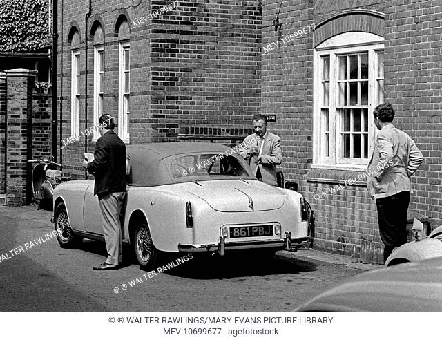 Colin Graham (left) and Benjamin Britten leaving his Graber bodied Alvis convertible. The man on the right is unidentified