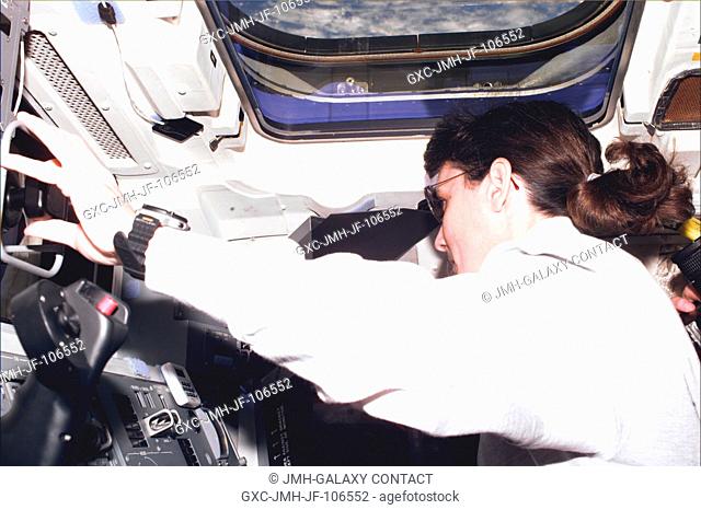 Astronaut Nancy J. Currie gently mated the 12.8-ton Unity connecting module to Endeavour's docking system late afternoon of Dec